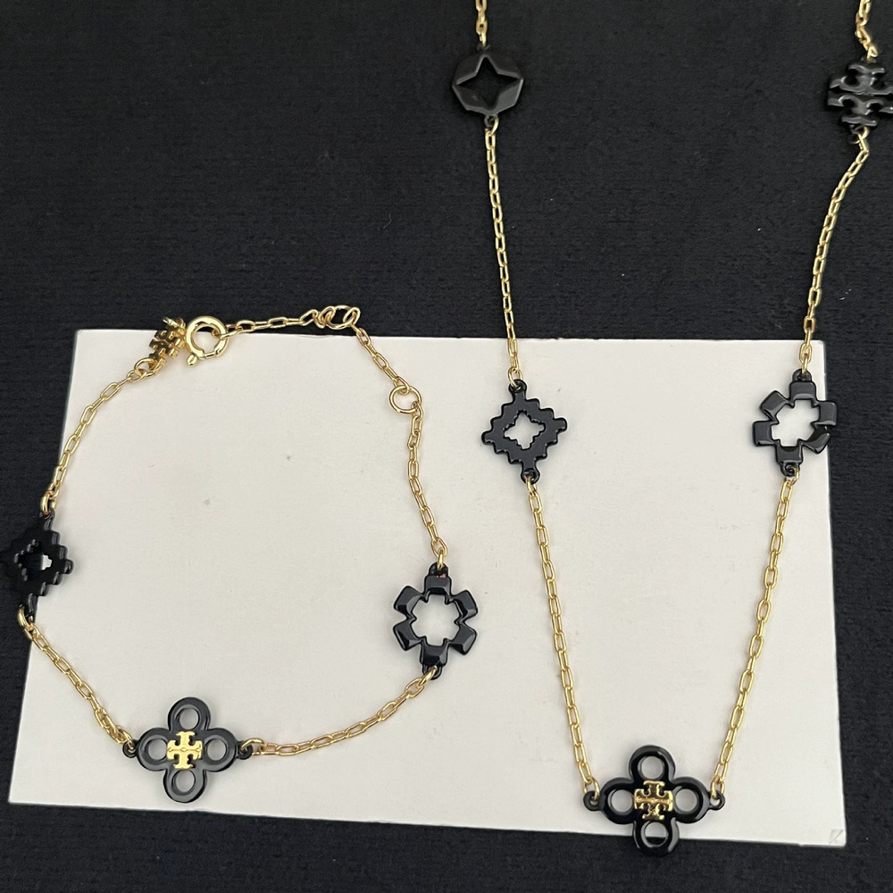 Tory Burch Clover Geometric Openwork Small Flower Metal Necklace